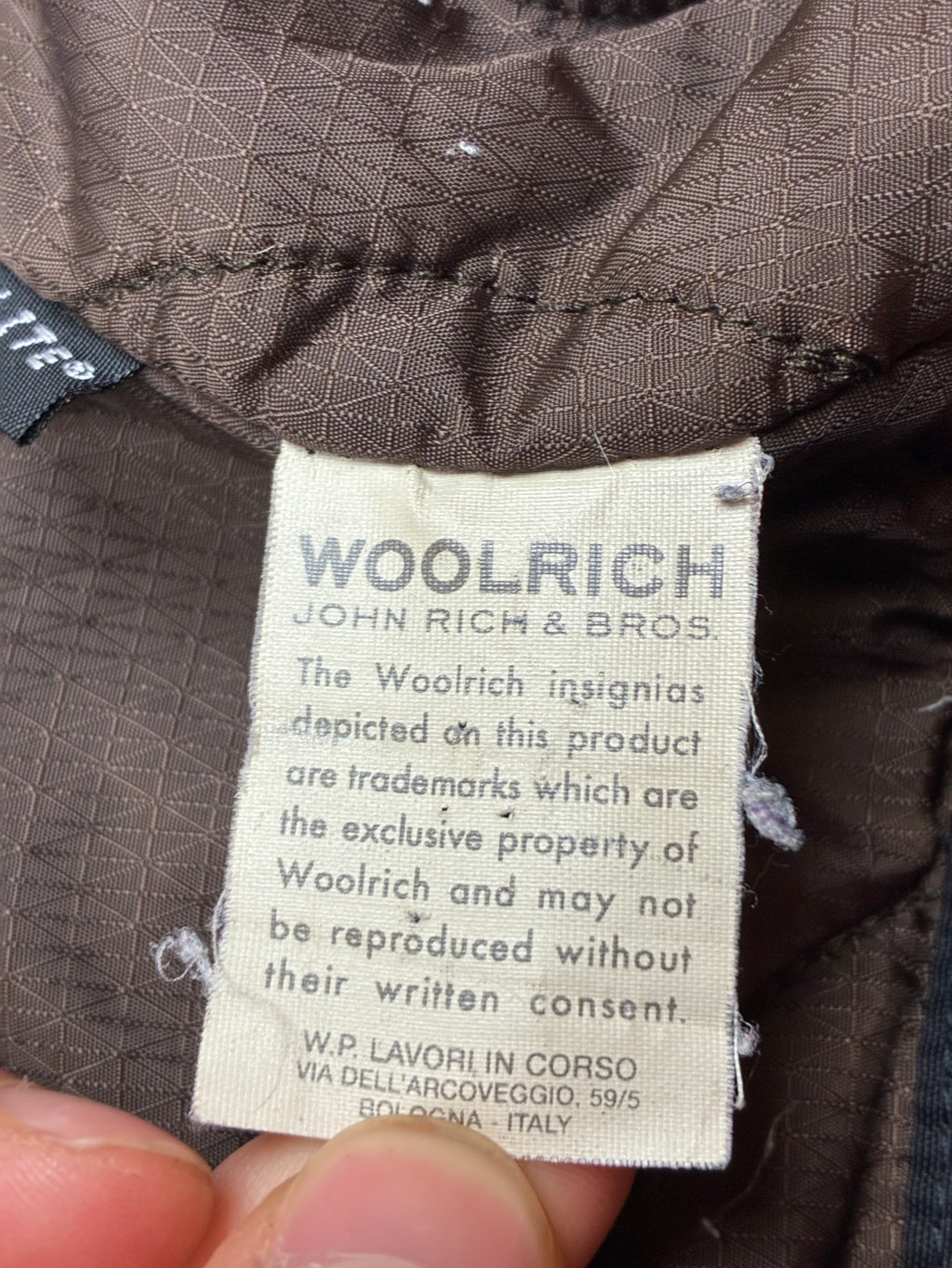 Woolrich John Rich & Bros — Giaccone tecnico Thermolite regolabile, colore nero.