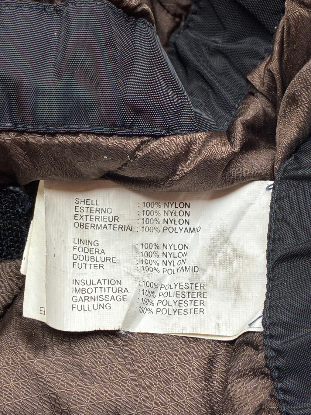 Woolrich John Rich & Bros — Giaccone tecnico Thermolite regolabile, colore nero.