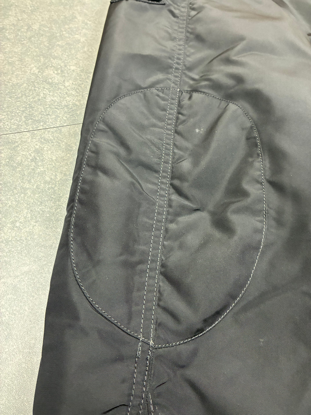 Woolrich John Rich & Bros — Giaccone tecnico Thermolite regolabile, colore nero.