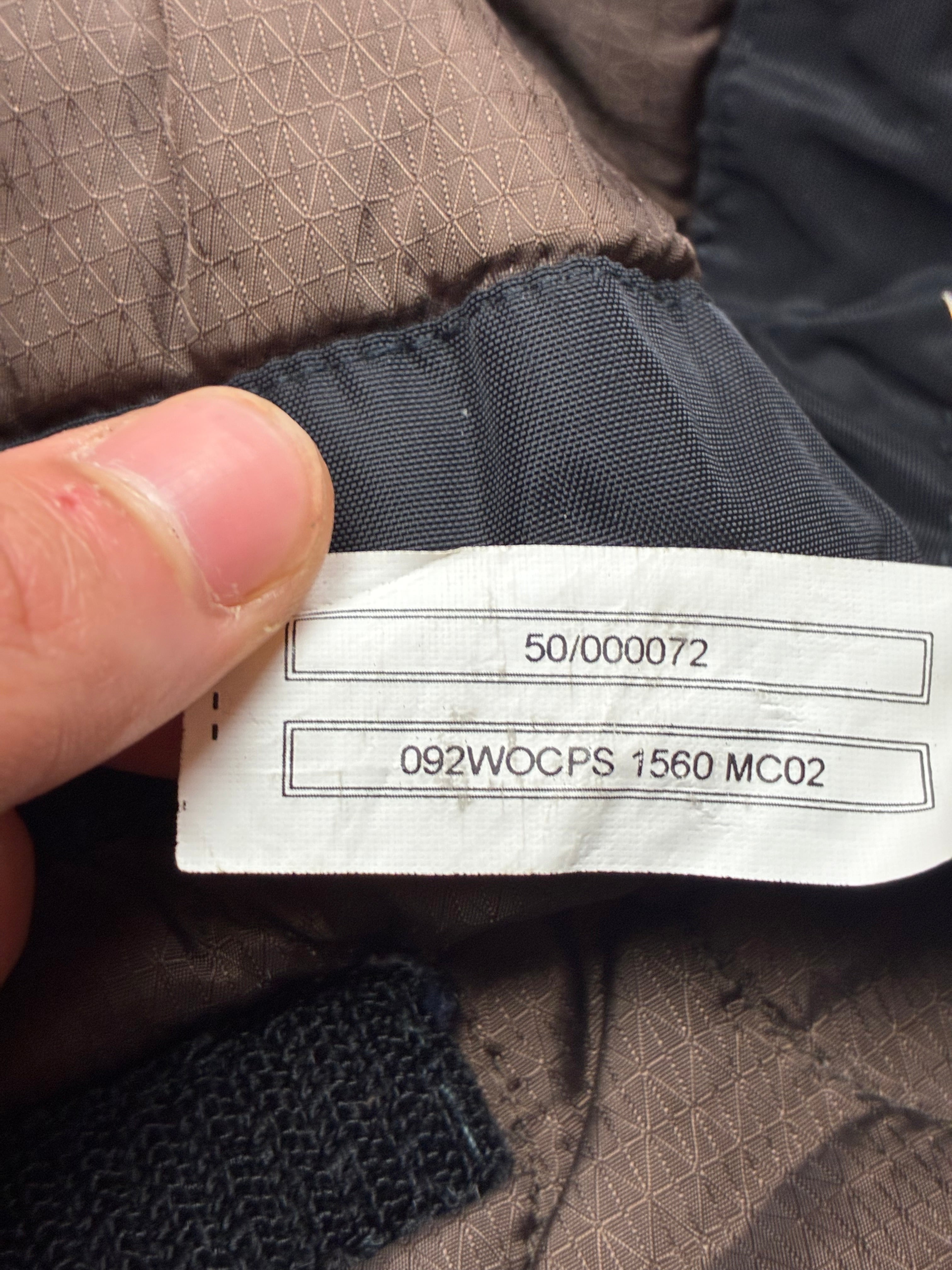 Woolrich John Rich & Bros — Giaccone tecnico Thermolite regolabile, colore nero.