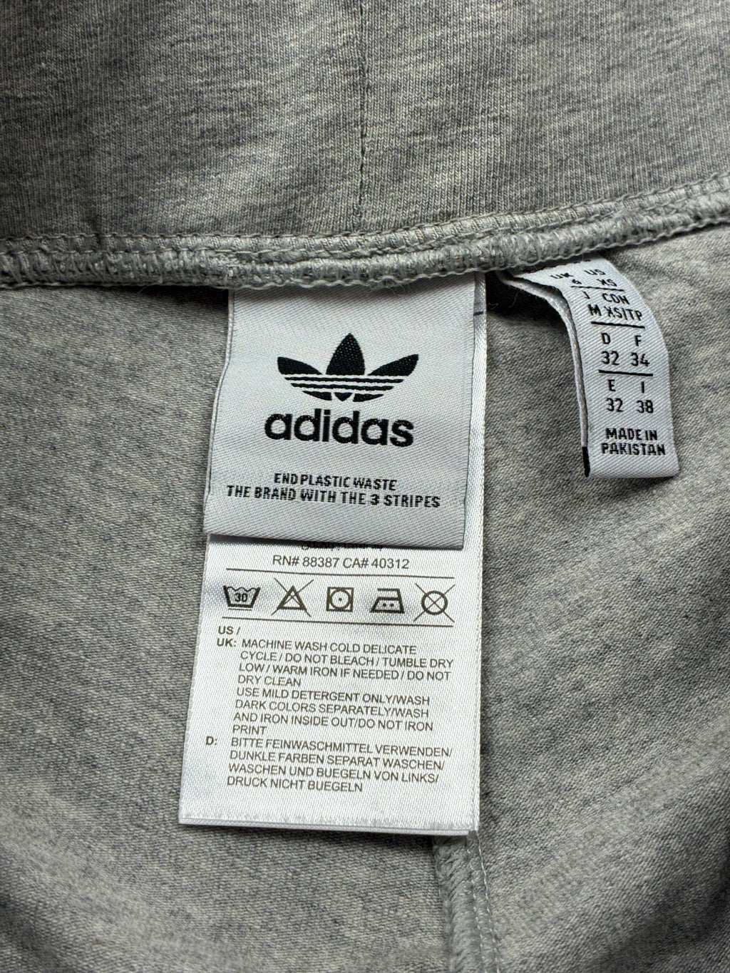 Leggings Adidas grigio con righe bianche - Taglia XS