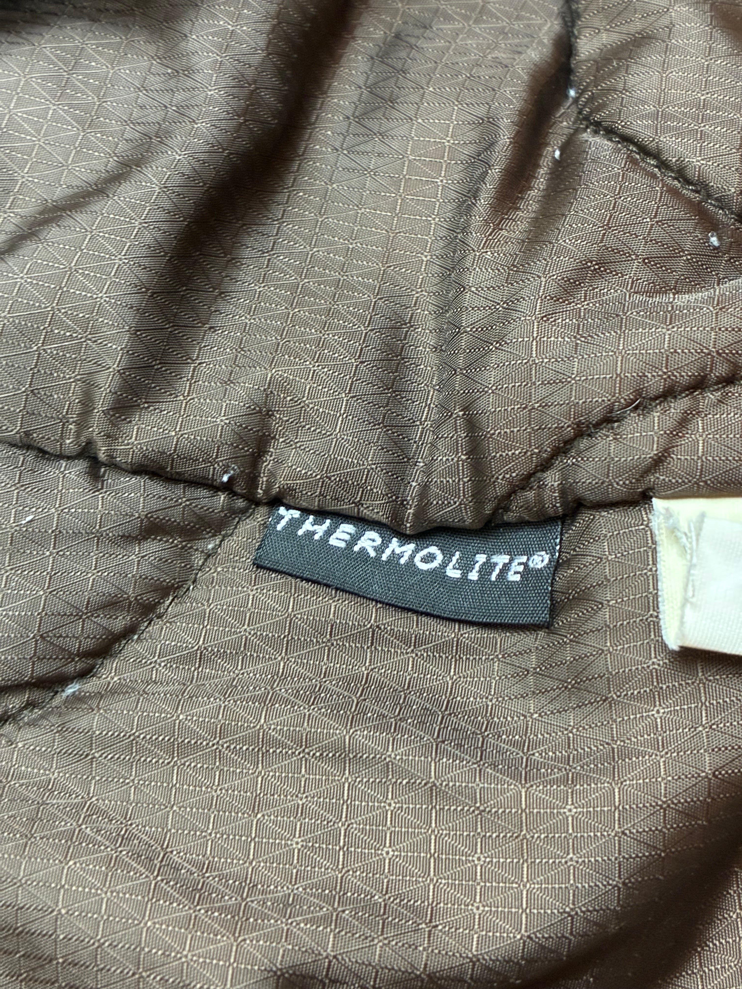 Woolrich John Rich & Bros — Giaccone tecnico Thermolite regolabile, colore nero.