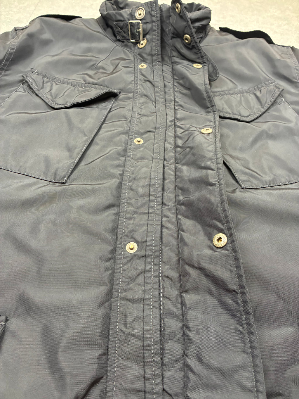 Woolrich John Rich & Bros — Giaccone tecnico Thermolite regolabile, colore nero.